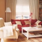 Plush living room seating idea with red and white couch
