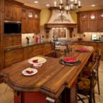 Grand Wood And Stone Tuscan Style Kitchen