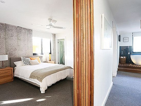 Stamped concrete wall design in bedroom Concrete Walls For Homes