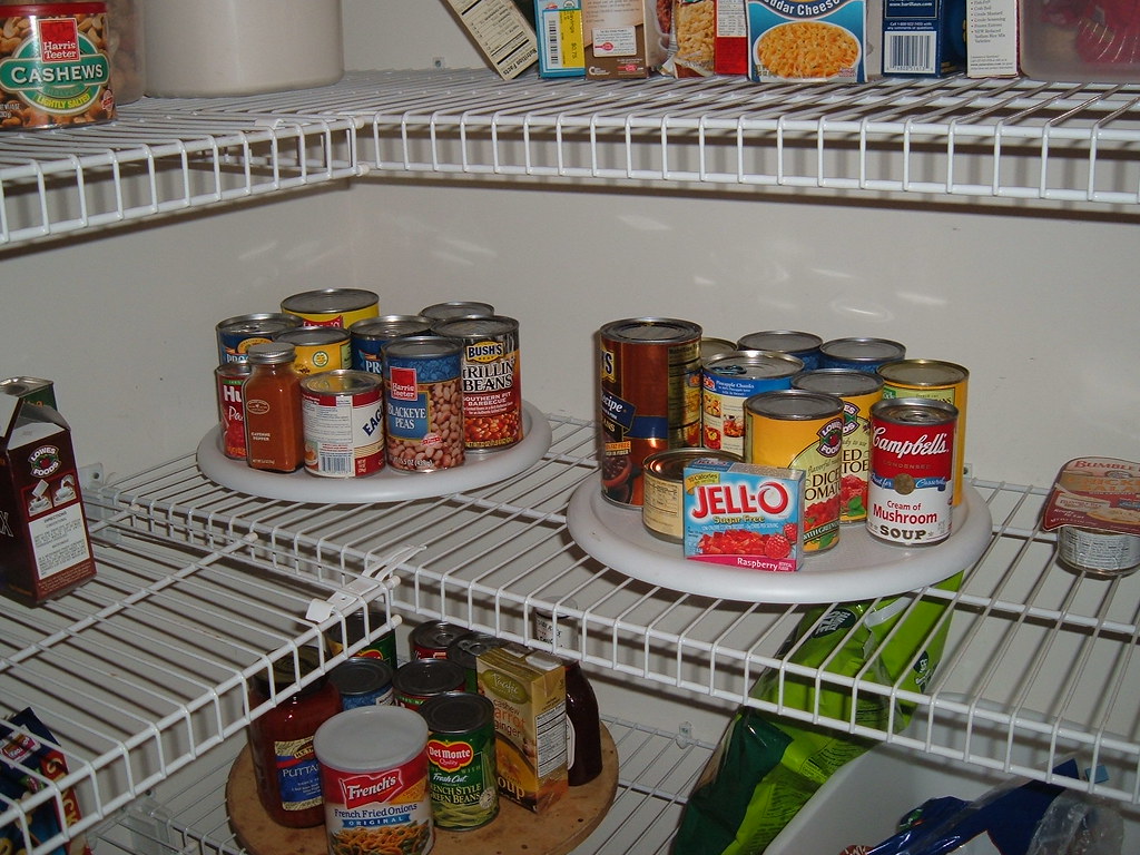 Canned goods organized in a cabinet
