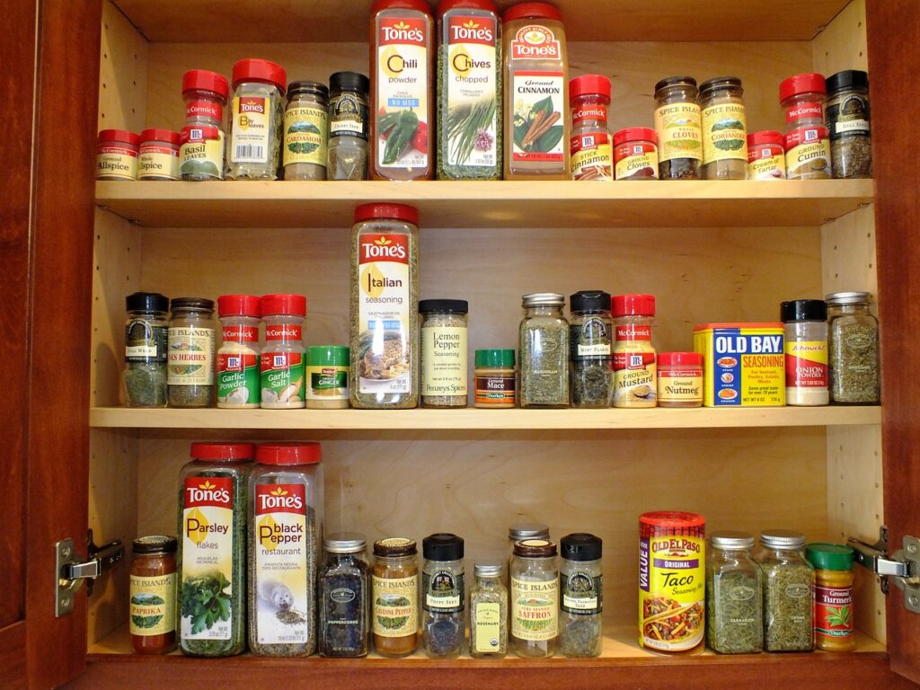 Cabinet full of spices and condiments