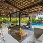 A Cozy Cabana Close To A Swimming Pool